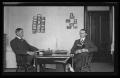 Thumbnail image of item number 1 in: '[Byrd Williams Jr. and brother Johnson, sitting in their dorm at U.T.]'.