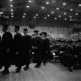 Photograph: [Young men in line to receive diplomas, 2]