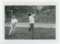 Photograph: [Man and Woman Playing Outside]