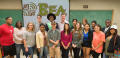 Photograph: [Don McGuire poses with BEA student group]