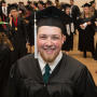 Primary view of [Young Man at the Fall 2014 Undergraduate Commencement Ceremony]