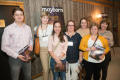Photograph: [Conference Attendees Holding Mayborn Magazine]