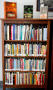 Primary view of [Bookshelf in Archives department of UNT Libraries]