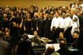 Photograph: [Band and choir on stage]