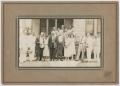 Photograph: [Unknown People in Front of House]