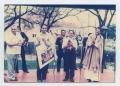 Photograph: [Mariachis and Priest]