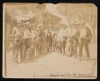 Photograph: [Ranch Hands Gathered in front of Ranch House]