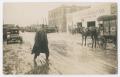 Postcard: [Photograph of a Man in the Street]
