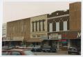 Photograph: [Shops on North Side of Denton Square]
