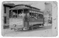 Primary view of [Walter Wiggs, Sr., Jim Grady, two unidentified men, and one unidentified boy on streetcar]