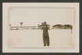 Photograph: [Man in Hat on Beach]