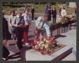 Thumbnail image of item number 1 in: '[Women with Flowers at Memorial]'.