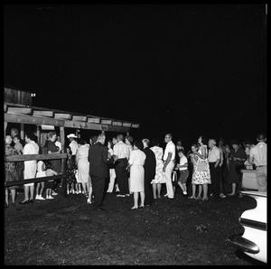 Primary view of object titled '[Crowd Outside Morrison Hay Barn, Opening Night]'.