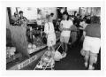 Photograph: [Customers Purchasing Vegetables]