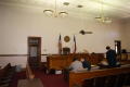 Photograph: [Men in Courtroom]