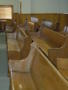Photograph: [Benches in Courtroom]