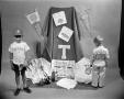 Photograph: [Two Boys with University of Texas Merchandise]