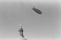 Primary view of [Blimp Flying Over Texas Capitol, Number 2]