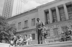 Primary view of object titled '[Man Speaking at Republican Party Rally at the University of Texas]'.