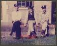 Primary view of [Three Men Sitting Outside Fire Station No. 7]