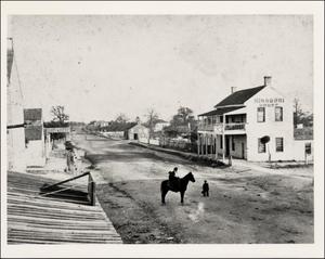 Primary view of object titled '[Man on Horse on East Sixth Street]'.