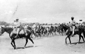 Primary view of object titled '[Soldiers on Horseback at Camp Mabry]'.