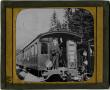 Photograph: Glass Slide of Man Waving from Rear of Train