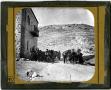 Thumbnail image of item number 1 in: 'Glass Slide of Horses and Wagons in Front of Building'.