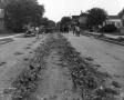 Photograph: [Removal of Railroad Tracks from E. 1st St.]