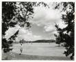 Photograph: [View of the green from trees on Austin Municipal Golf Course]