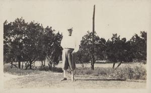 Primary view of object titled '[Portrait of a golfer at Municipal Golf Course]'.