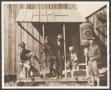 Photograph: [Soldiers and Boy on Porch]