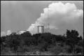 Photograph: [Water Tanks on a Hill]