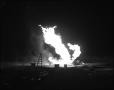 Photograph: [Fire Rages at Oil Well]