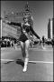 Photograph: [Texas Majorette Performs in Armed Forces Parade]