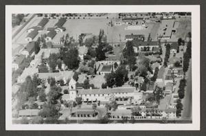 Primary view of object titled '[Postcard with Aerial View of a Church and Complex]'.