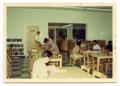 Thumbnail image of item number 1 in: '[Students in the Library]'.