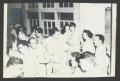 Photograph: [Uniformed Men and Women at Party]