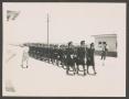Photograph: [Class 44-W-7 Marching at Graduation]