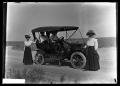 Photograph: [People with Car]