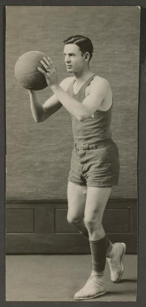 Primary view of object titled '[Male Basketball Player With His Arms Raised]'.