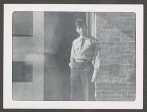 Primary view of object titled '[William Thomas in Doorway]'.