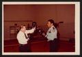 Photograph: [Photograph of Lee Brown and a Houston Fire Department Administrator …