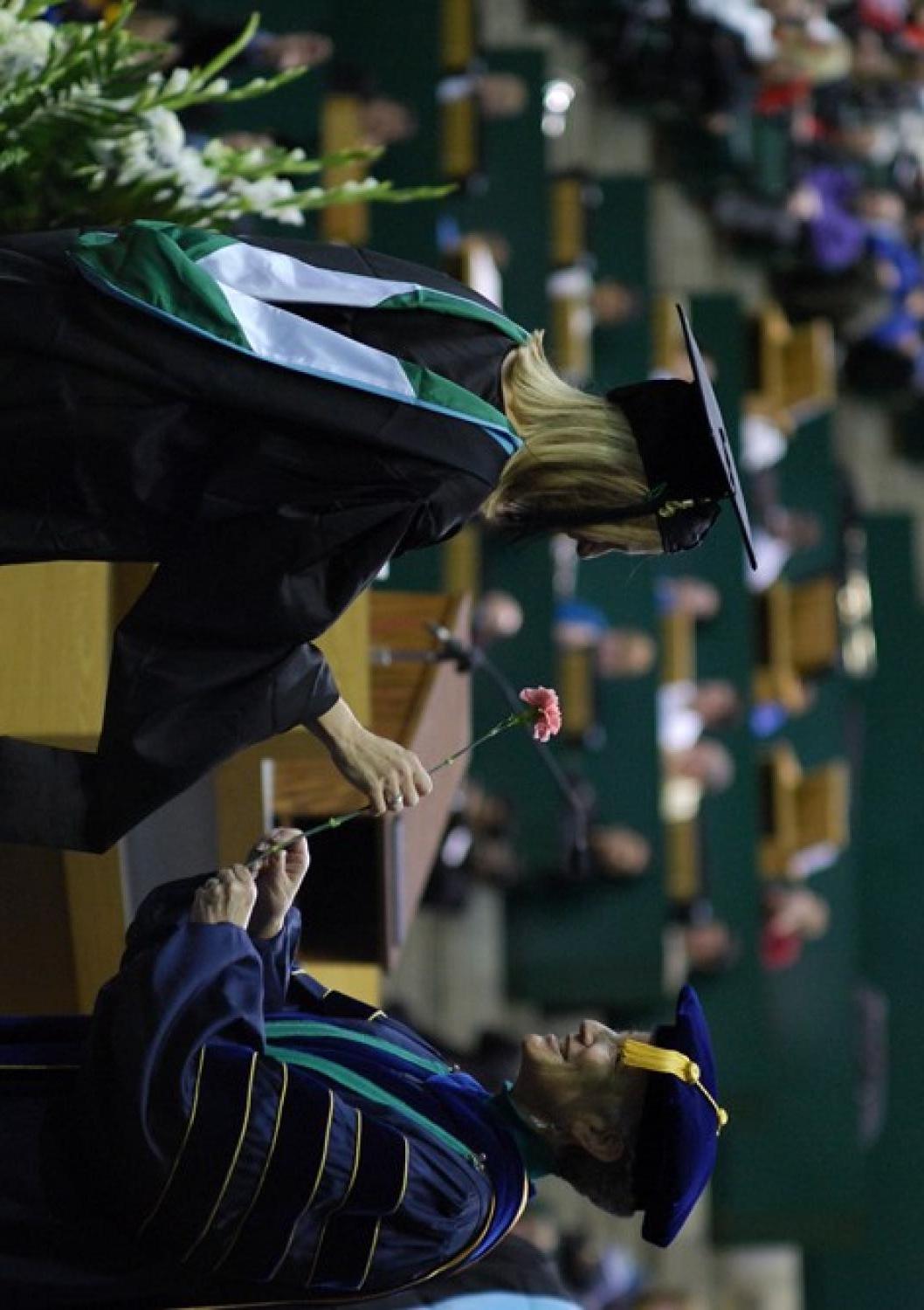 [Student at Masters Commencement Ceremony]
                                                
                                                    [Sequence #]: 1 of 1
                                                