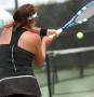Photograph: [Girl Swinging Tennis Racket]
