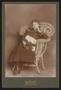 Photograph: [Portrait of an Unknown Woman in a Wicker Chair]