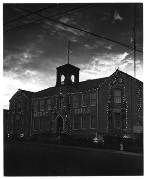 Primary view of object titled '[City of Denton: City Hall, N. Elm decorated for Christmas]'.