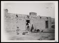 Photograph: [Photograph of Adobe House with Family]