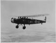 Thumbnail image of item number 1 in: 'Single Wing Plane Flying Near Randolph Field'.