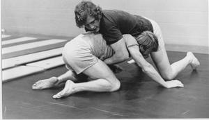 Primary view of object titled 'Two Male Students in Wrestling Class'.
